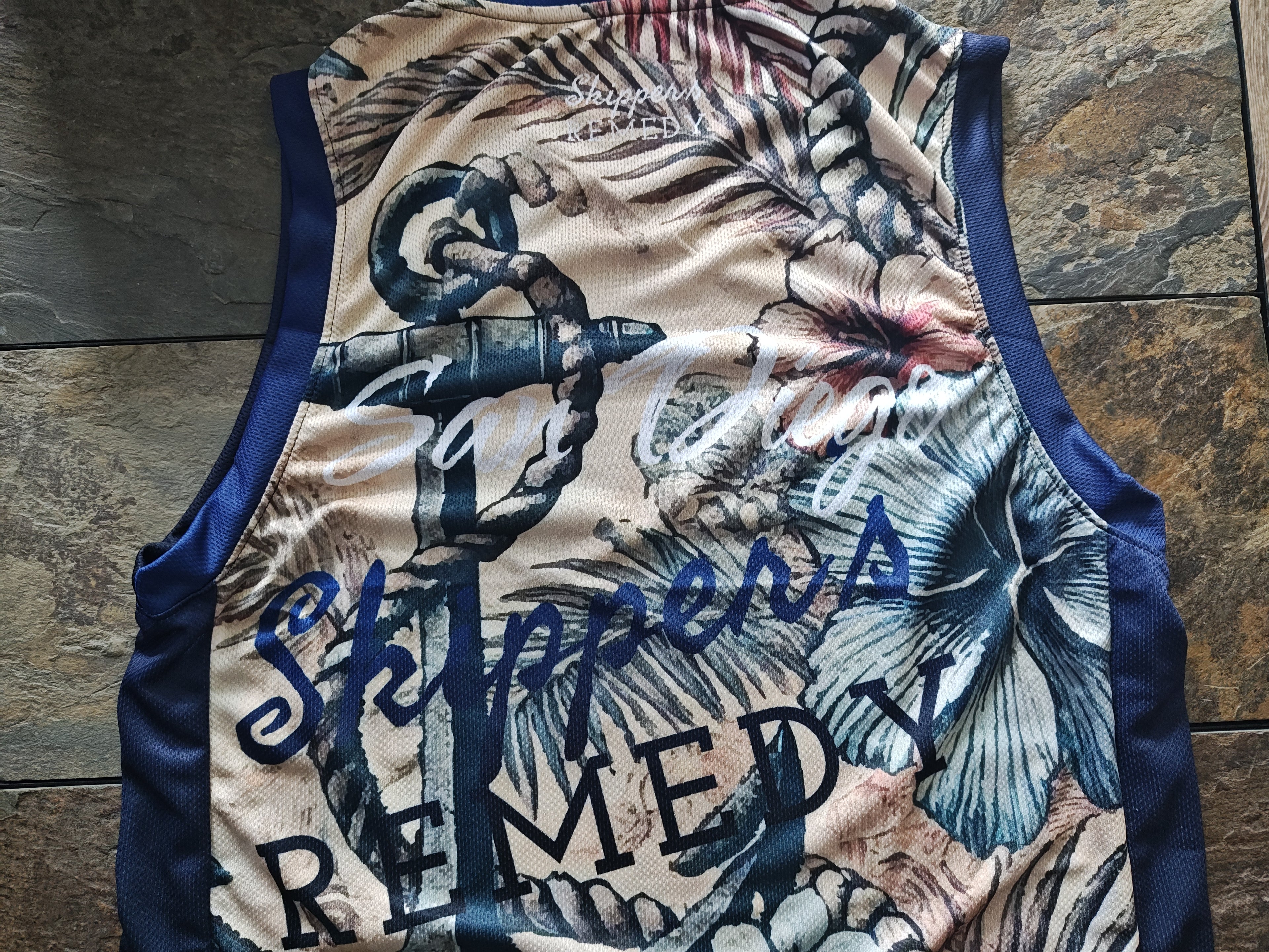Skipper's Remedy - Aloha : Recycled unisex basketball jersey