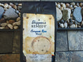 Compass Rose Blend coffee bag from Skipper's Remedy, on a stone background