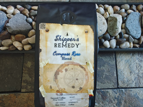 Compass Rose Blend coffee bag from Skipper's Remedy, on a stone background
